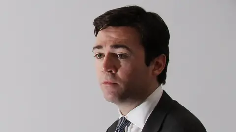 Getty Images Shadow Education secretary Andy Burnham speaks during a press conference at Labour Party Media Centre on December 22, 2010 in London, England. Mr Burnham and Labour leader Ed Miliband spoke at the press conference launching the 'Speak out for your Generation' campaign, aimed at giving young people a voice in Britain. 