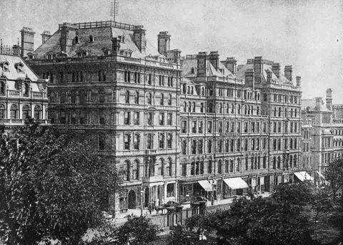 British Library A black and white picture of the original Grand Hotel, it shows the full building with its large facade and dozens of rectangular windows 