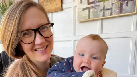 Emily Harris Emily Harris with her baby