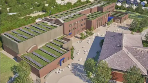 Erewash Borough Council A computer generated view of the new school plan from above, with banks of panels and grass roofs visible