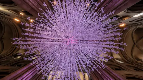 Durham Cathedral/NNP Thousands of handmade paper doves hanging in Durham Cathedral