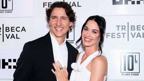 Justin Trudeau and Katy Perry at the Tribeca Festival's World Premiere of "Katy Perry: The Lifetimes Tour - Live from Paris" held at the OKX Theater on June 08, 2026 in New York, New York. 