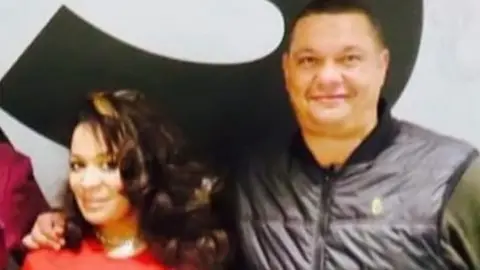 Webby with his arms around Rowetta