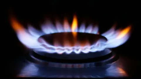 A gas flame on a hob.