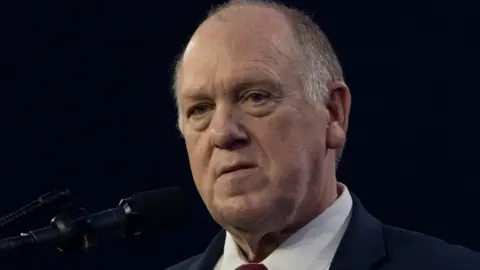 Reuters Tom Homan in a white shirt and black suit jacket during his speech at the AmericaFest 2024 conference sponsored by conservative group Turning Point USA in Phoenix, Arizona in December