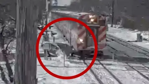 A train collides with a car in Hinsdale, Illinois.