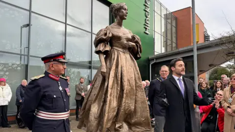 Full length of a bronze statue of Ada Lovelace stands outside the Hinckley campus of the North Warwickshire and South Leicestershire College in Lower Bond Street. People attended the unveiling of the sculpture.
