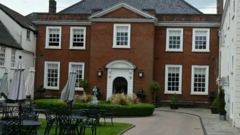 Geograph/David Smith The Assembly House in Norwich, hotel and restaurant with tables and chairs outside front