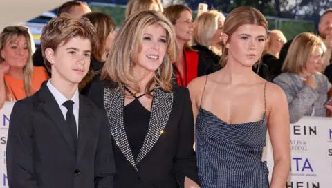 Getty Images Kate Garraway with children Darcey and Billy