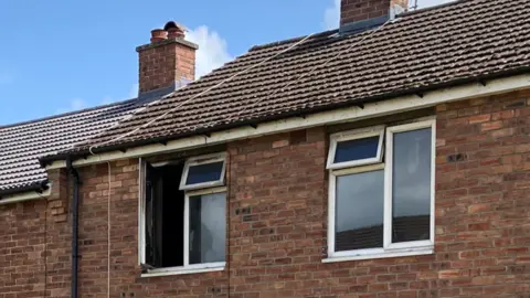 BBC Fire-damaged house in Wrexham