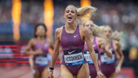 Keely Hodgkinson celebrates after winning the women's 800m at London Diamond League in 2024.