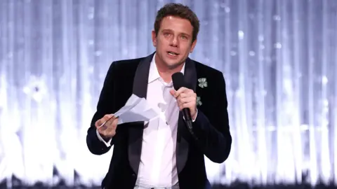 Getty Images Jonathan Anderson receives the Designer of the Year Award on stage during The Fashion Awards 2025 presented by Pandora at the Royal Albert Hall on December 01, 2025 in London, England