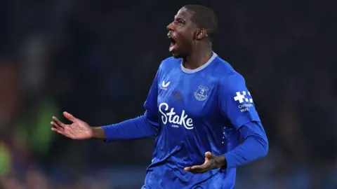 Abdoulaye Doucoure playing for Everton