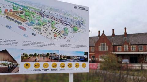 A board at the site explaining the transport hub plans