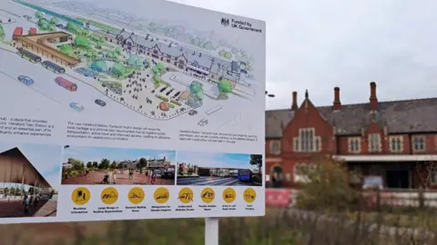 Local Democracy Reporting Service A board at the site explaining the transport hub plans