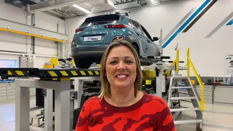 Sarah Windrum of MIRA Technology Park stood at a car testing facility