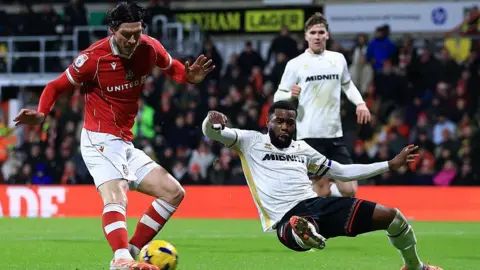 Kieffer Moore scores Wrexham's fourth goal against Sheffield United