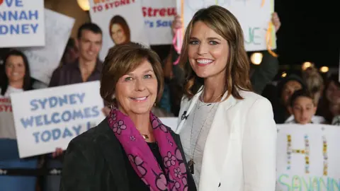 Savannah Guthrie poses alongside her mother Nancy Guthrie during a production break whilst hosting NBC's "Today Show" live from Australia at Sydney Opera House on May 4, 2015 in Sydney, Australia.