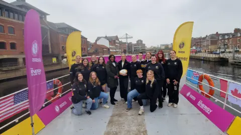 BBC / Naj Modak Rugby players on a boat on the River Ouse in York