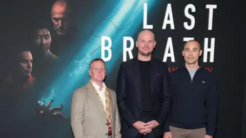 Getty Images (L-R) Duncan Allcock, Chris Lemons and Dave Yuasa attend the "Last Breath" New York Premiere at AMC Lincoln Square Theater on February 25, 2025 in New York City