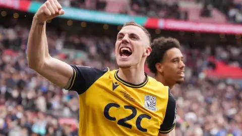 Southend United's Ben Goodliffe celebrates after winning the Isuzu FA Trophy final at Wembley Stadium, London