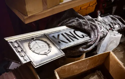 Anneleen Lindsay The King's Theatre sign covered in cloth and polish during the renovation