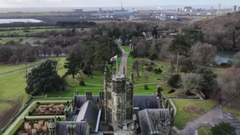 Swansea University An aerial photo with Margam Castle in the foreground and the Port Talbot steelworks in the distance