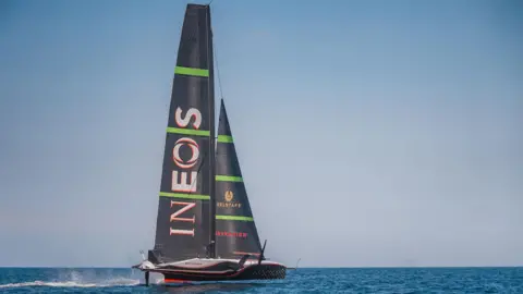 INEOS Britannia RB3 boat on water in Barcelona