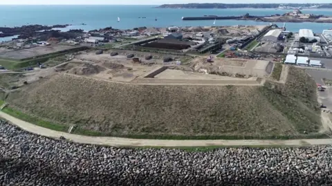 BBC La Collette waste mound looking on to Havre des Pas beach