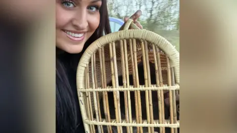 Danielle Arme Danielle with Bodhi in a basket