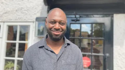 Brian Farmer/BBC Ledley King outside pub