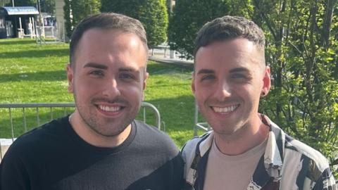 Girls Aloud superfans Corey and Jason outside the SSE Arena ahead of the group's first concert in the city for more than a decade