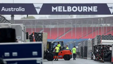 Workers prepare for the 2026 Australian Grand Prix 