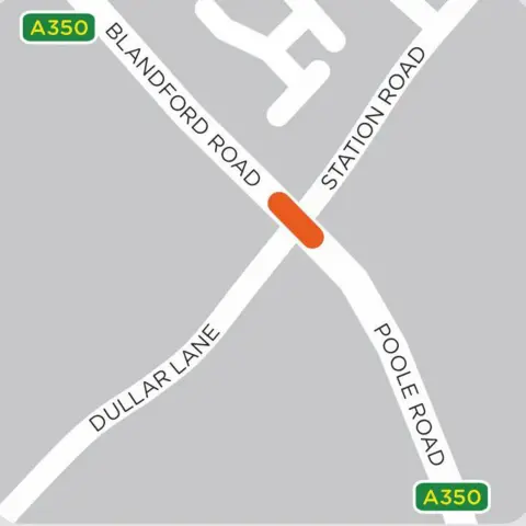 SGN A graphic of the roads and the section of the road where the works will take place is marked in orange. It sits at the crossroads between Blandford Road, Poole Road, Dullar Lane and Station Road.