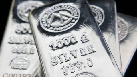 Several one kilogram bars of silver.