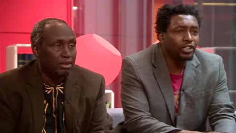 Ngugi Wa Thiong'o sat with his son, Mukoma 