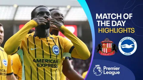 Yankuba Minteh celebrates with his Brighton teammates