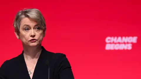 PA Media Yvette Cooper speaking at Labour conference