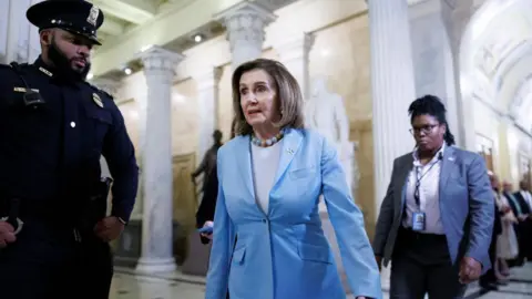 Getty Images Nancy Pelosi is photographed walking the halls of the US Capitol building 