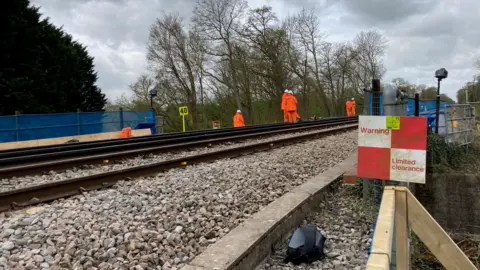 BBC/Piers Hopkirk Rail engineers on the site of the Bough Beech emankment