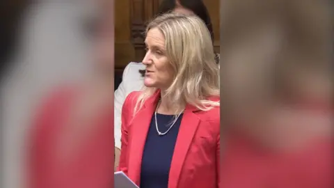 Kim Leadbeater MP in a pink jacket