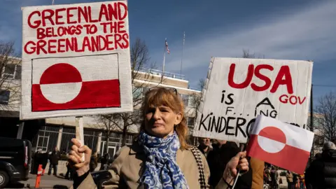 Protesters rally outside the U.S. Embassy, condemning U.S. pressure on Greenland and Denmark and denouncing the U.S. government's controversial visit to Greenland in Copenhagen, Denmark, on March 29, 2025. 