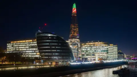 General view of London's City Hall, The Shard tower, and The Queen's Walk along the River Thames 