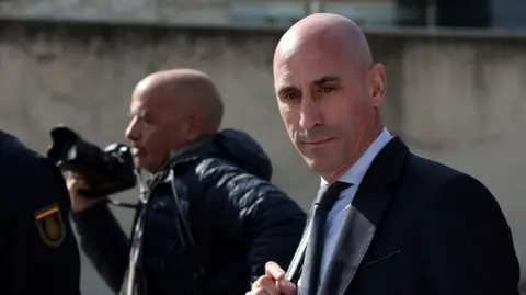 Luis Rubiales leaves the court