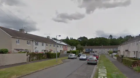 Google A street in Salisbury with a grey sky in the background.
