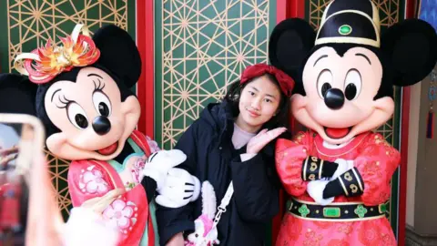 Getty Images Minnie and Mickey Mouse at Shanghai Disneyland - Chinese New Year 2025