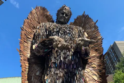 The knife angel. A 27ft-tall (8m) sculpture in the shape of an angel with it's hands held out, made from 100,000 blades.