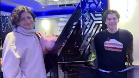 Everest Lounge Market Harborough Zendaya and Tom Holland in a restaurant