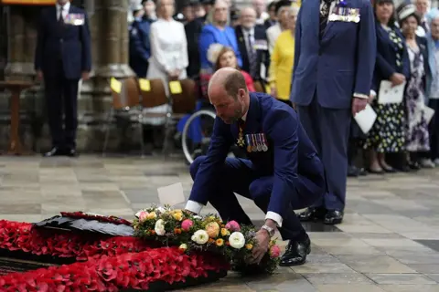 Jordan Pettitt/Pool via REUTERS The Prince of Wales lays a wreath at the grave of the Unknown Warrior during a service of thanksgiving at Westminster Abbey in London on the 80th anniversary of VE Day. Picture date: Thursday May 8, 2025.