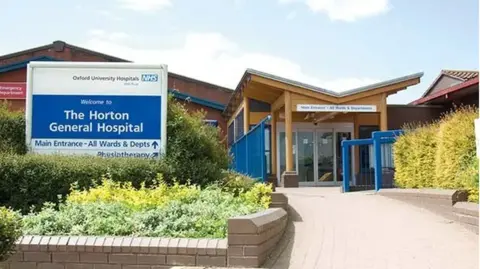 A general view picture of The Horton Hospital in Banbury, a single-storey hospital building.
